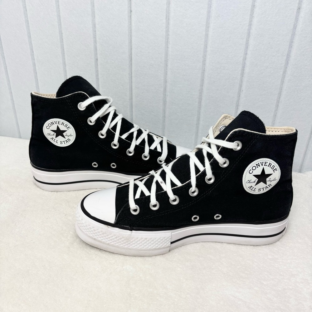 Converse Black and White High-Top Athletic Shoes